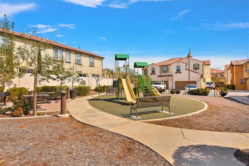 Playground with slides in residential area.