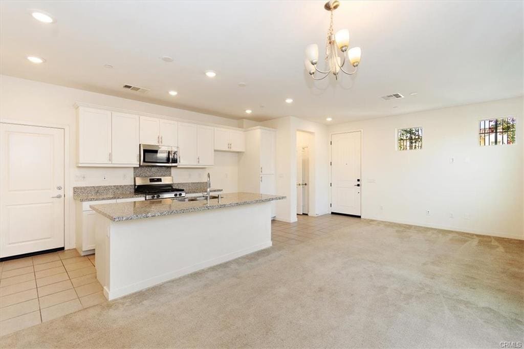 Open kitchen and living room interior.