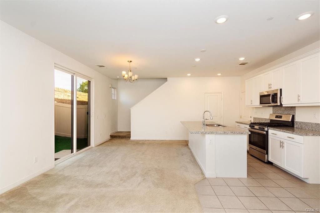 Open-plan kitchen and living room space.